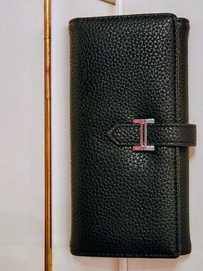 ** Classy Black pretty fashion long wallet! Never used. No brand.